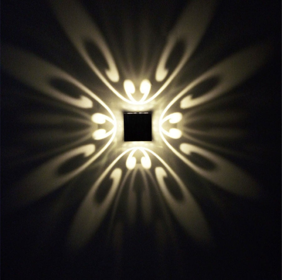 Solarflash I LED-Wandleuchte mit bunten Lichtprojektionen - Energieeffizientes Design